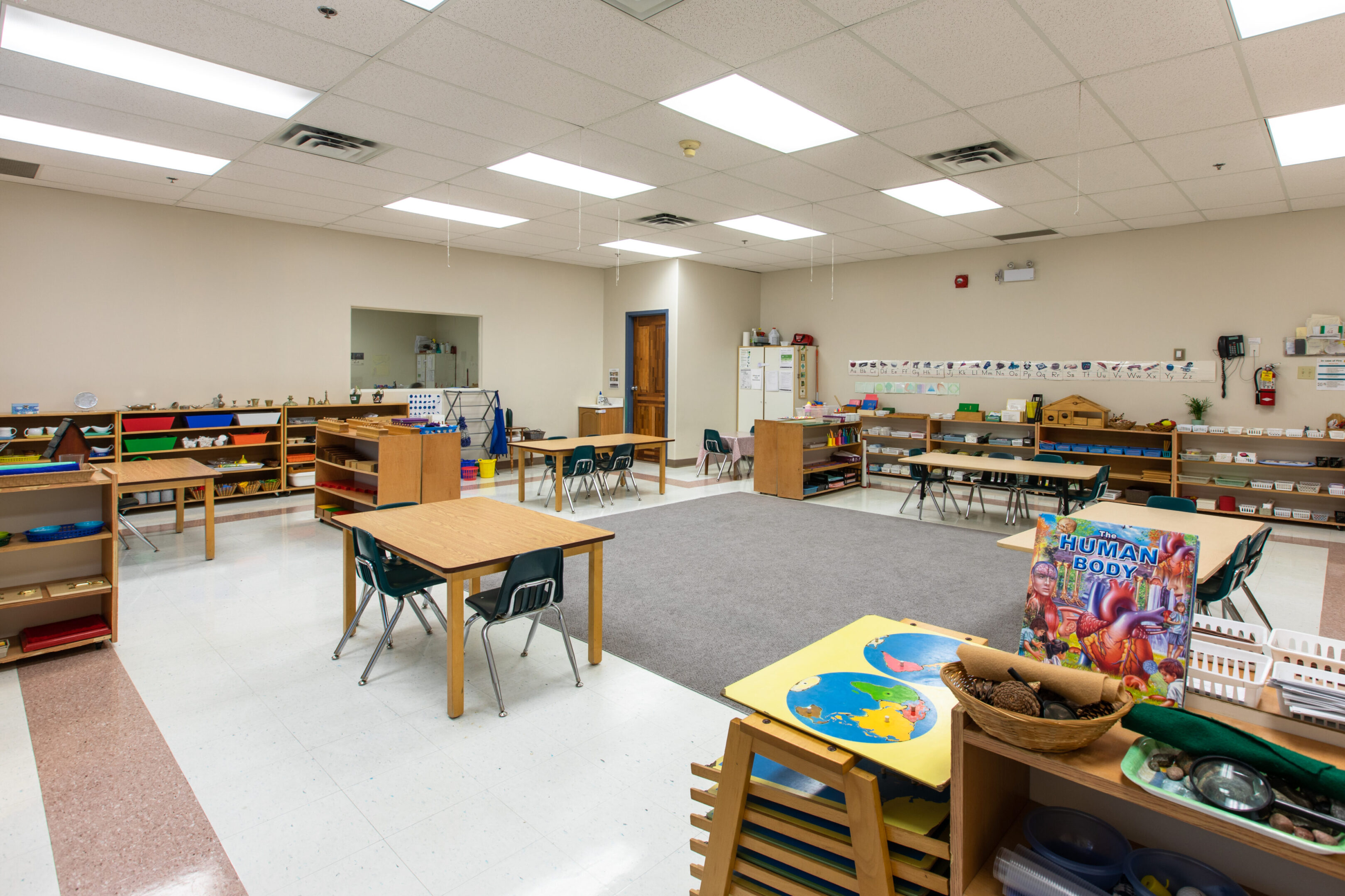 Bright, organized classroom with learning materials.